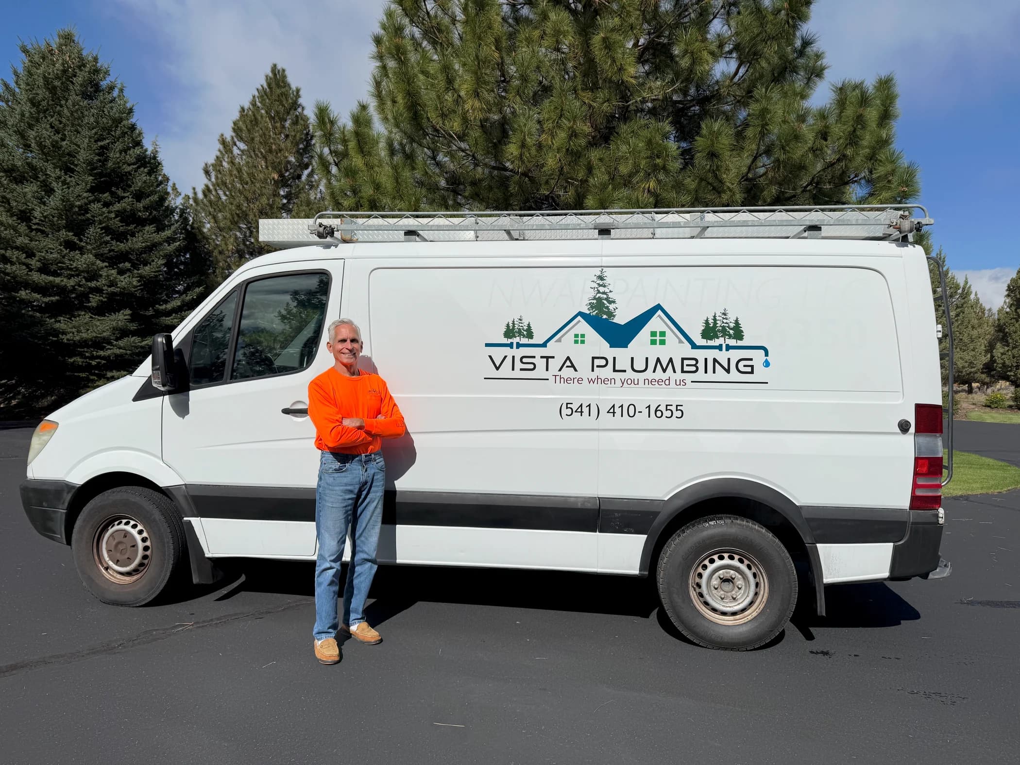 Gary Ford, founder of Vista Plumbing, beside the company’s service van
