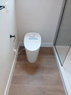 Installed toilet in a finished bathroom